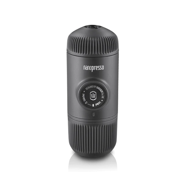 Wacaco Nanopresso portable hand-pump espresso maker in charcoal black — 336g and 6.14 inches long, patented pump requires 15% less force than the original Minipresso, pressurized dual-wall basket, the NS Adapter that ships in the bundle SKU opens Nespresso Original capsule compatibility.